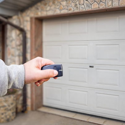Kingsport security key fob pointing to a garage door